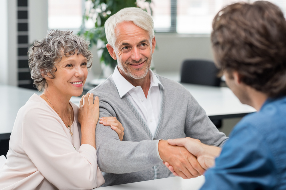 Elderly couple inquiring about long term care quotes